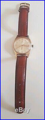 Omega Mens Watch, 9ct gold, with box. 38mm bezel rare find, running cal. 601