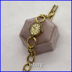 Vintage OMEGA 18K Gold Ladies Watch 18k Gold Band WithpapersRARE AND UNUSUAL